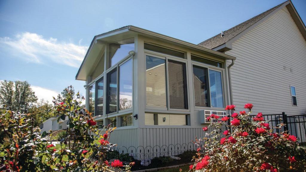 Energy-efficient sunroom with large windows and modern design on a residential home in Charlotte, North Carolina